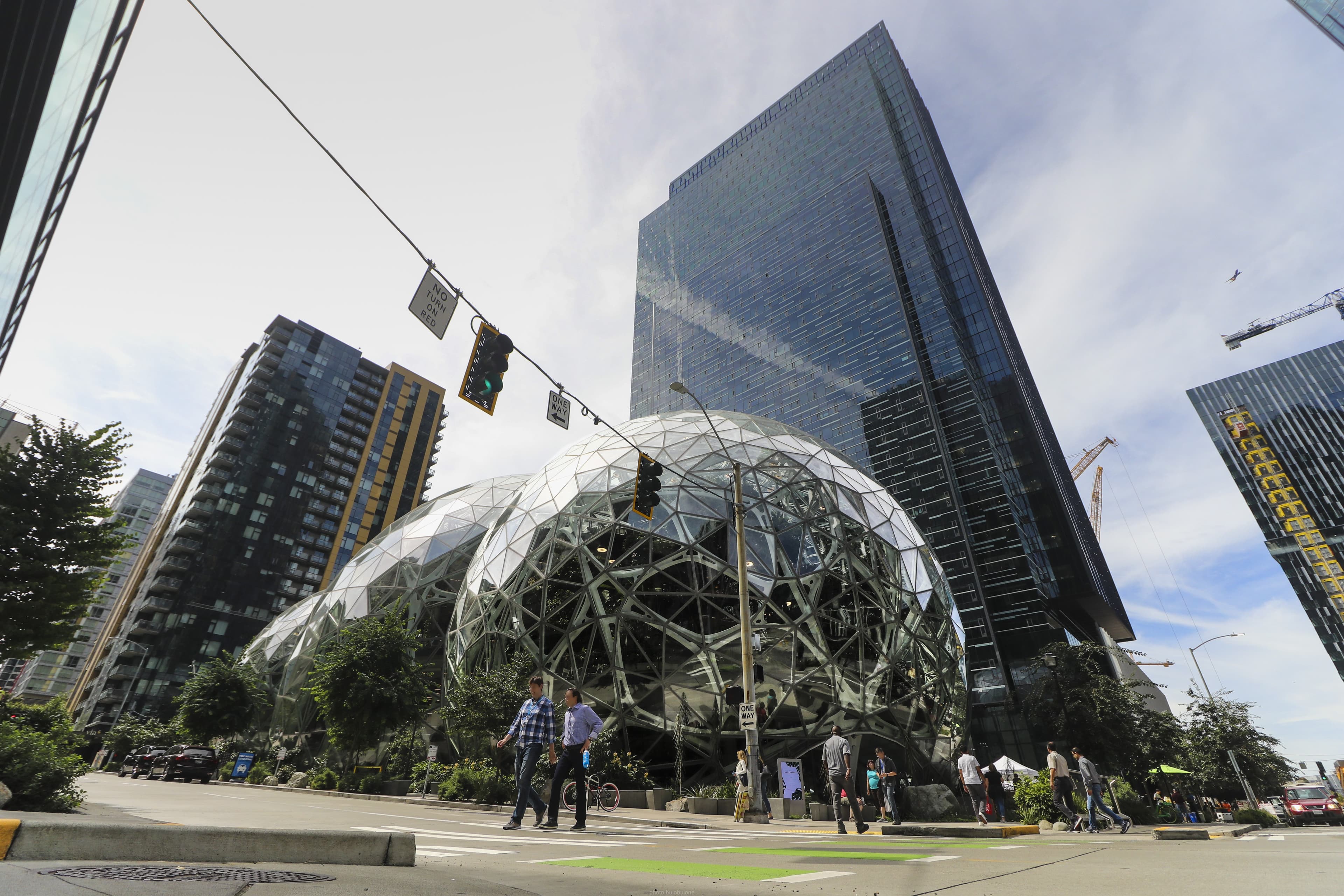 Street-level view of the Amazon Spheres glass conservatories and Day 1 tower at Amazon's Seattle headquarters