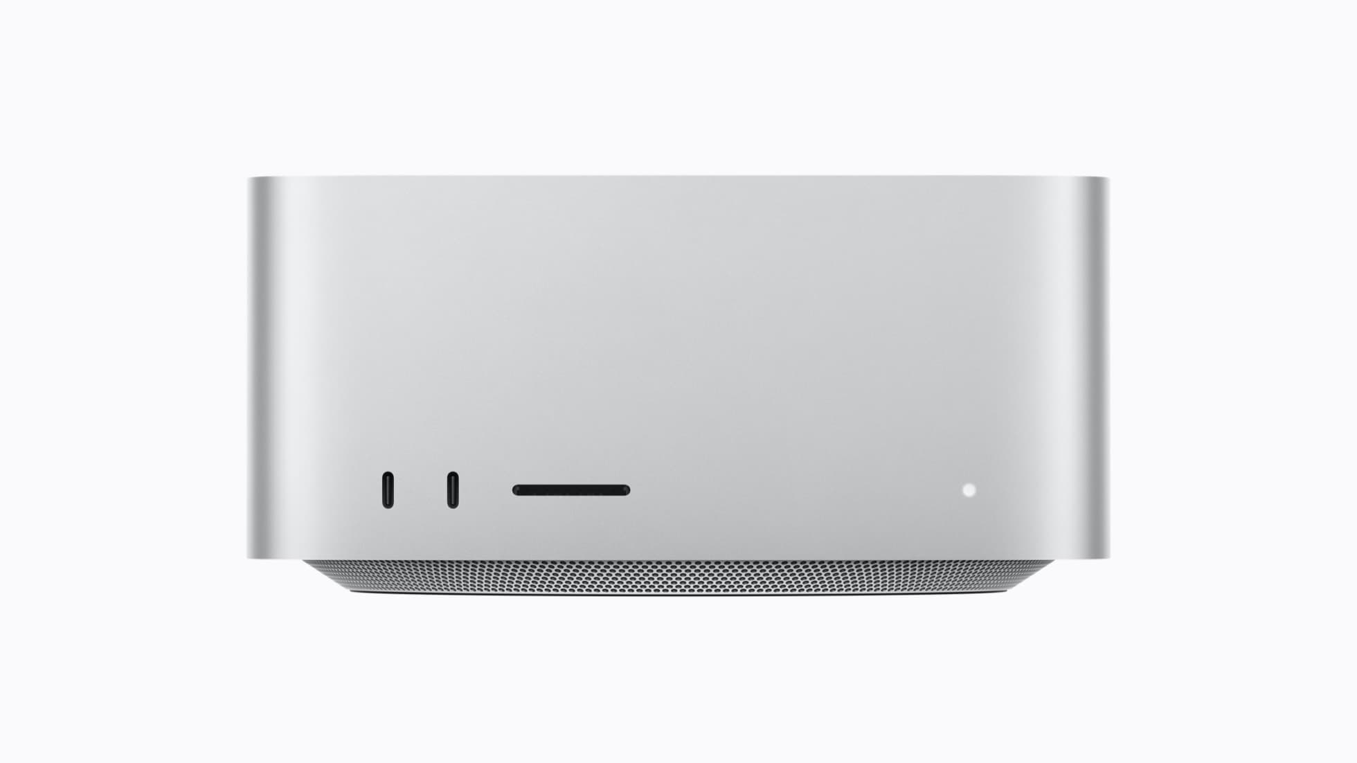 Front of the silver Mac Studio with two USB-C ports, an SDXC slot, and a status light
