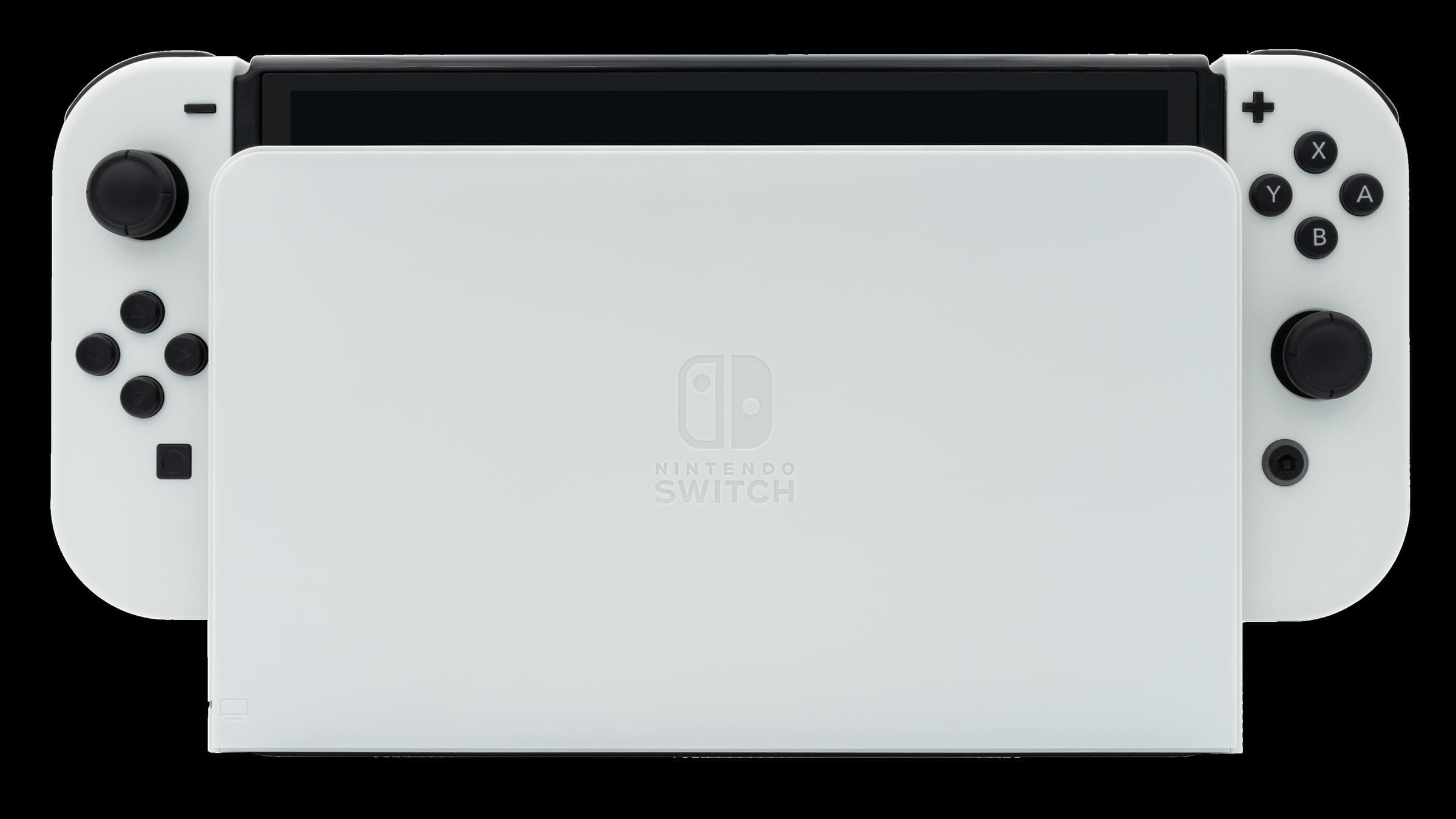 White Nintendo Switch OLED model docked in its white dock, photographed against a black background