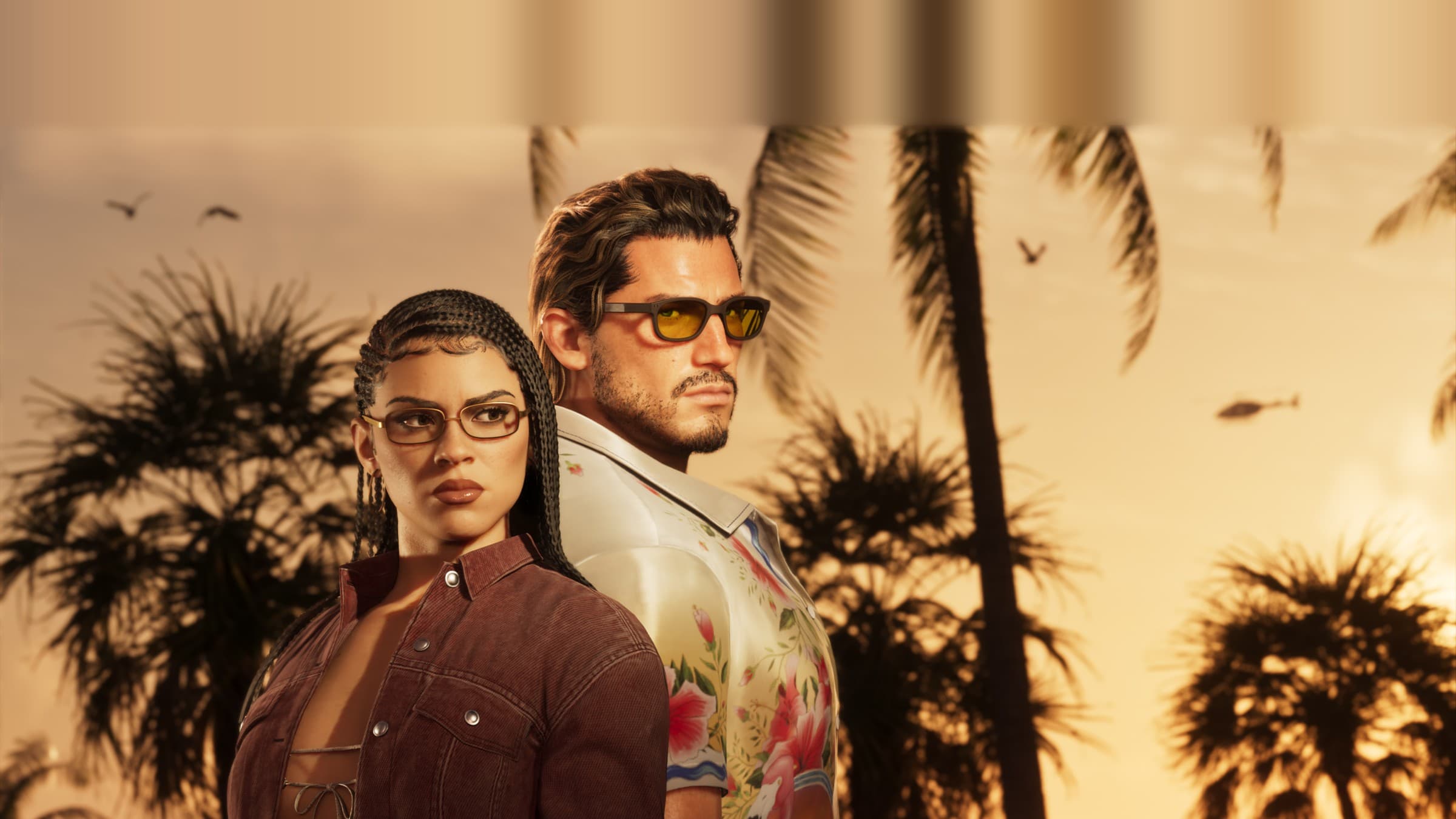 Grand Theft Auto VI official key art: Lucia and Jason standing back to back against a tropical sunset with palm trees