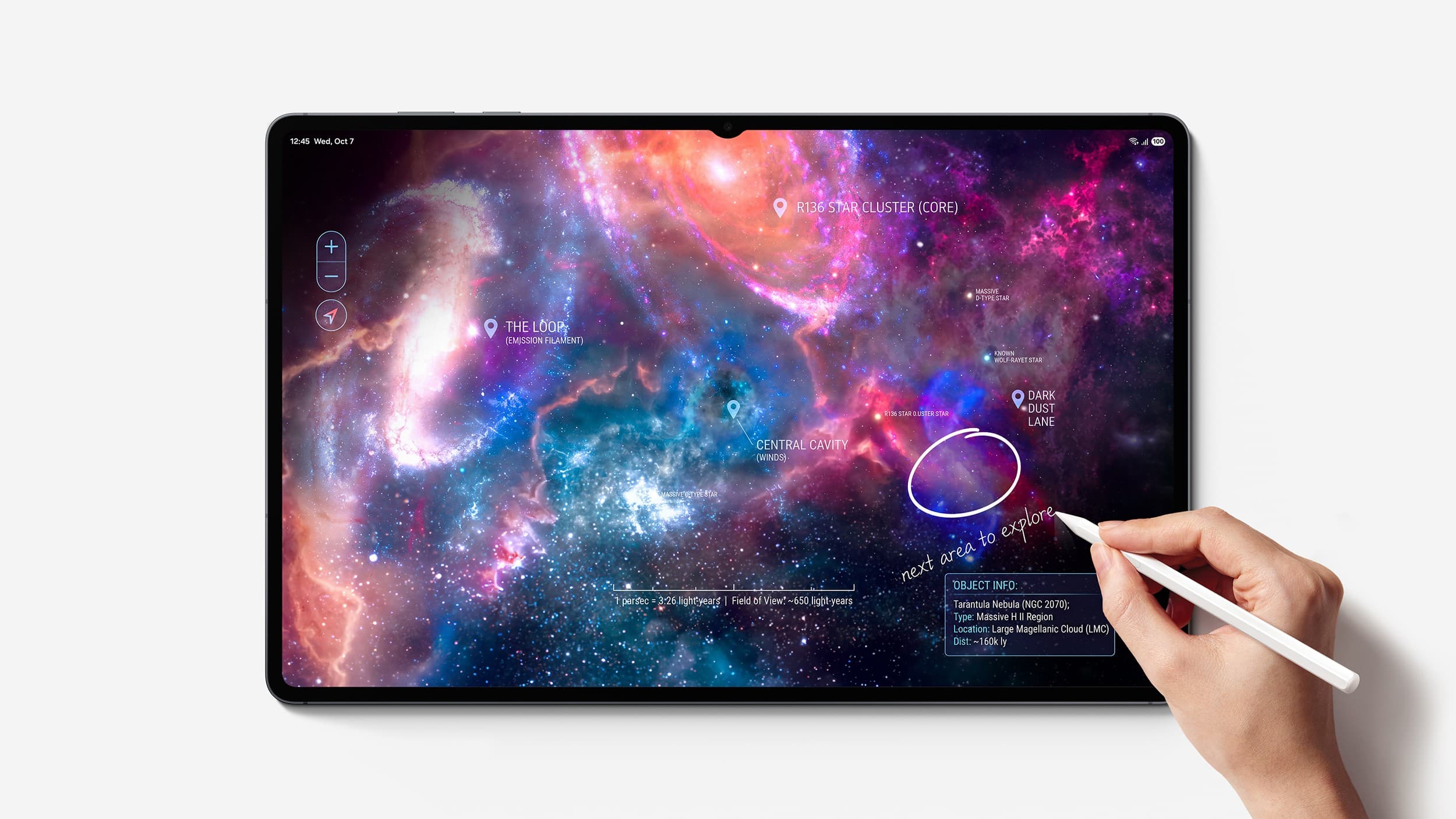 Hand holding a white S Pen against a Galaxy Tab S12 Ultra screen showing a colorful nebula map with handwritten notes