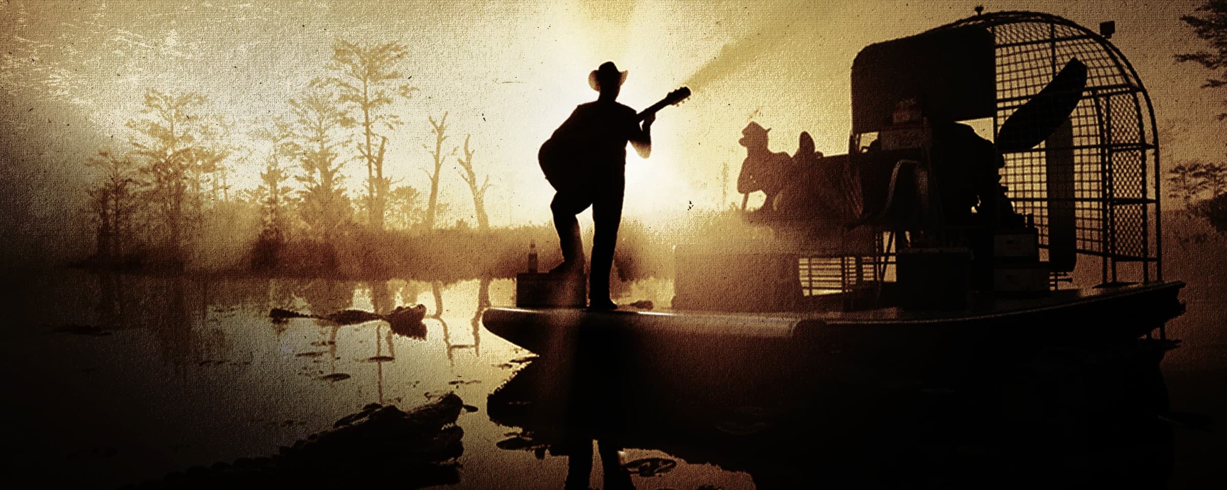 Official artwork for Back Country Radio in GTA 6: a sepia-toned silhouette of a man playing guitar while standing on an airboat in a misty swamp